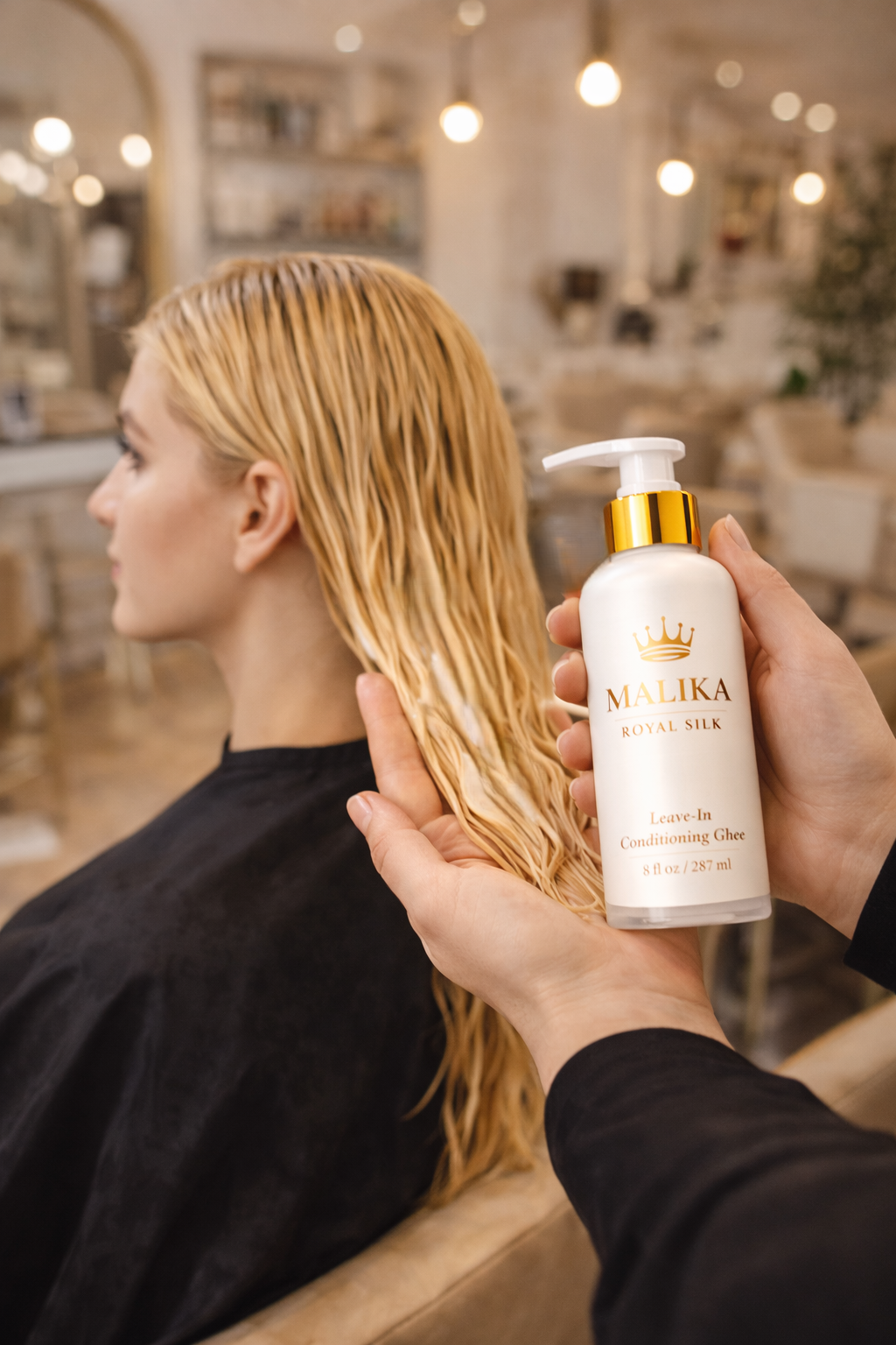 Luxury leave-in conditioner being applied for smooth, hydrated, shiny hair